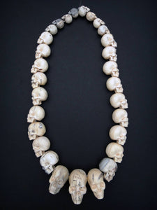 Carved Wood Skull Strand