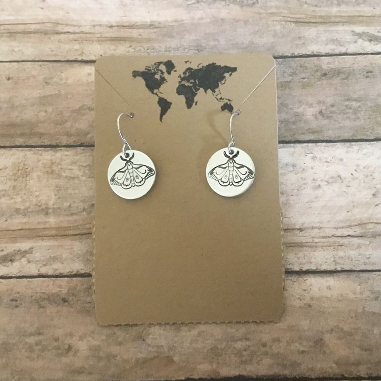 Moth small circular earrings in silver color