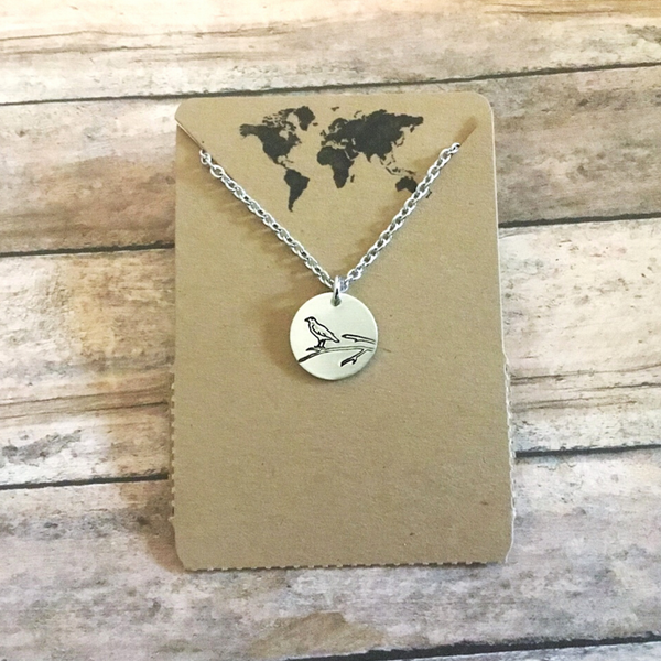 Raven bird small circular charm necklace in silver color